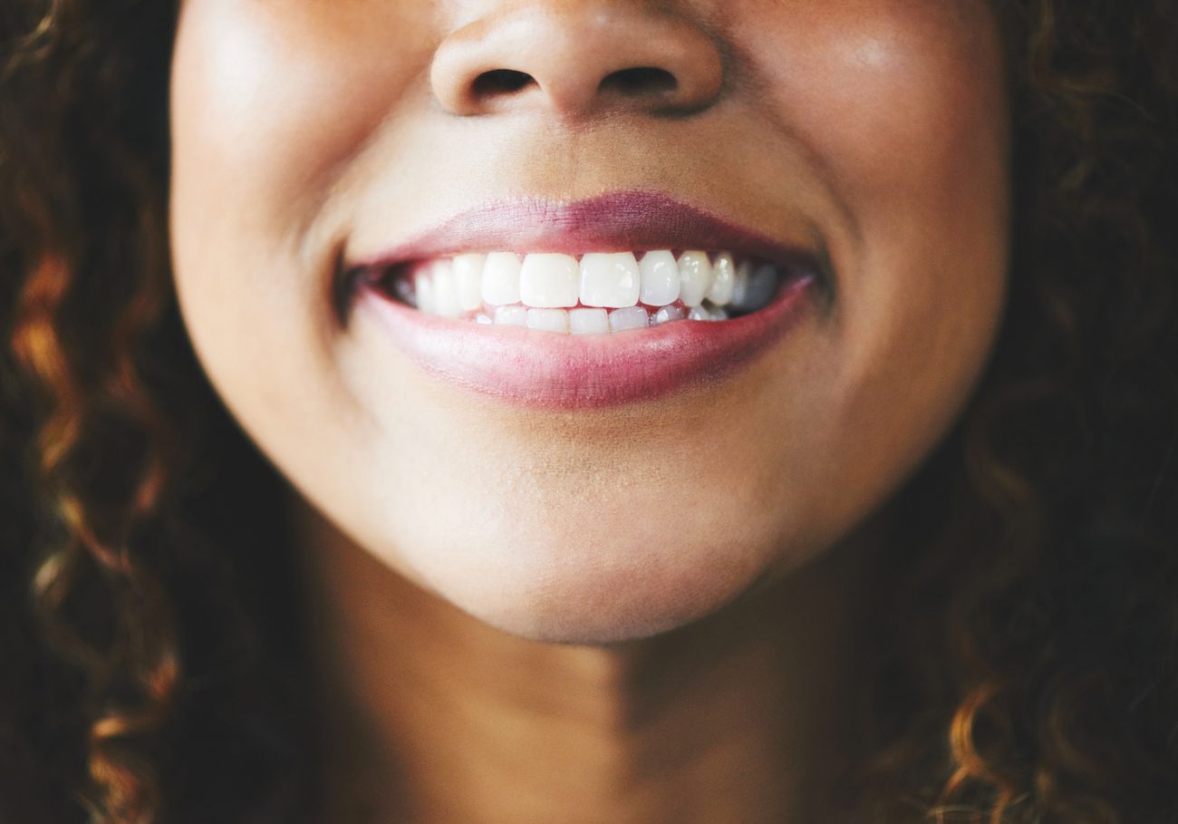 Two popular solutions, porcelain veneers and teeth bonding, offer effective ways to achieve your desired look.